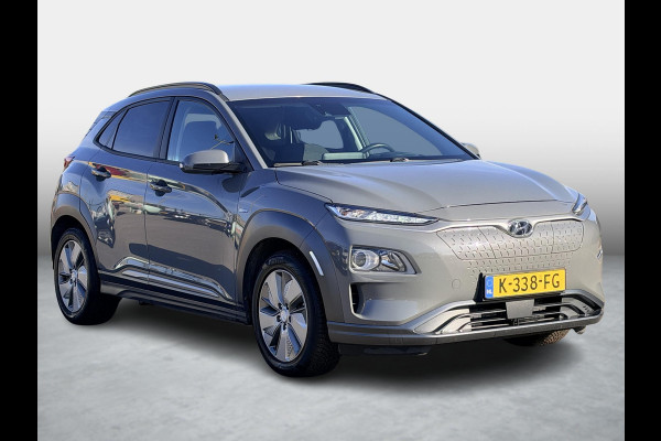Hyundai Kona EV Fashion 39 kWh SoH 89.9% | 3 Fase | Warmtepomp | Fabrieksgarantie | Camera | Navigatie | Adaptieve Cruise | Dealeronderhouden |