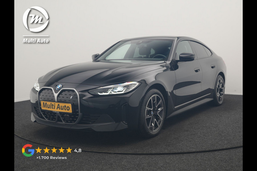 BMW i4 eDrive 35 70 kWh 286pk Dealer O.H | SOH 96,3% | Adaptive Cruise | Camera | Lederen Sportstoelen Verwarmd | Apple Carplay | Keyless | Navigatie | Virtual | DAB | 18"L.M |