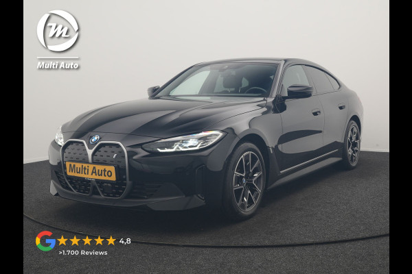 BMW i4 eDrive 35 70 kWh 286pk Dealer O.H | SOH 96,3% | Adaptive Cruise | Camera | Lederen Sportstoelen Verwarmd | Apple Carplay | Keyless | Navigatie | Virtual | DAB | 18"L.M |
