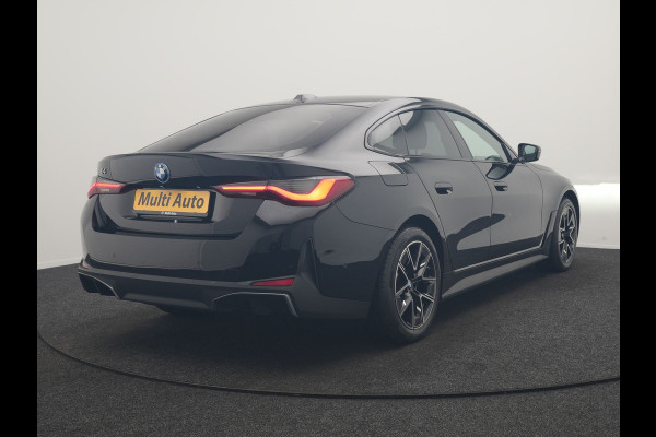 BMW i4 eDrive 35 70 kWh 286pk Dealer O.H | SOH 96,3% | Adaptive Cruise | Camera | Lederen Sportstoelen Verwarmd | Apple Carplay | Keyless | Navigatie | Virtual | DAB | 18"L.M |
