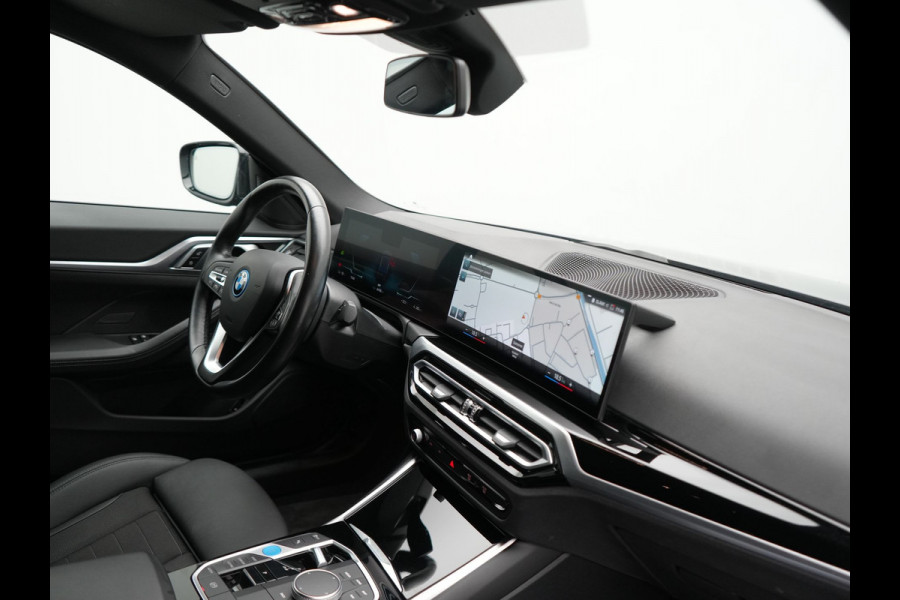 BMW i4 eDrive 35 70 kWh 286pk Dealer O.H | SOH 96,3% | Adaptive Cruise | Camera | Lederen Sportstoelen Verwarmd | Apple Carplay | Keyless | Navigatie | Virtual | DAB | 18"L.M |