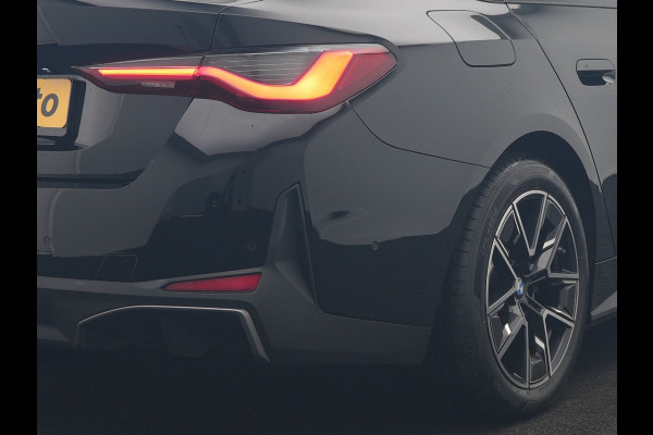 BMW i4 eDrive 35 70 kWh 286pk Dealer O.H | SOH 96,3% | Adaptive Cruise | Camera | Lederen Sportstoelen Verwarmd | Apple Carplay | Keyless | Navigatie | Virtual | DAB | 18"L.M |