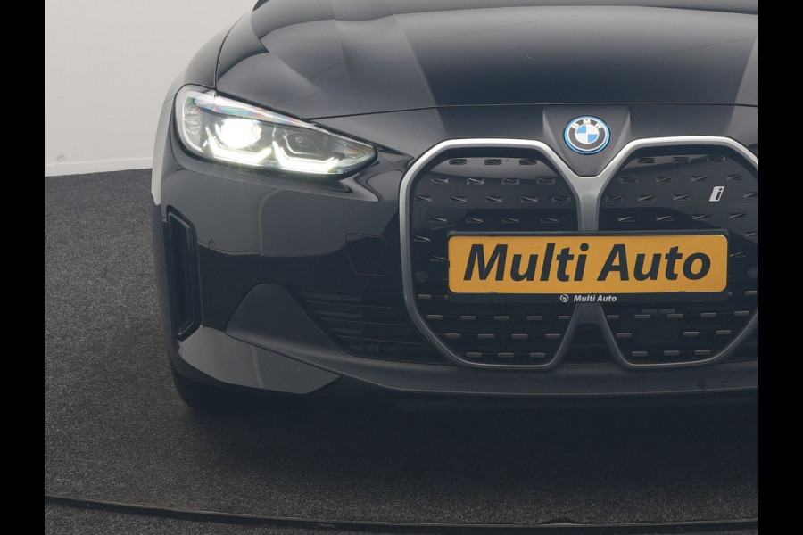 BMW i4 eDrive 35 70 kWh 286pk Dealer O.H | SOH 96,3% | Adaptive Cruise | Camera | Lederen Sportstoelen Verwarmd | Apple Carplay | Keyless | Navigatie | Virtual | DAB | 18"L.M |
