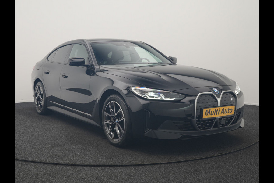BMW i4 eDrive 35 70 kWh 286pk Dealer O.H | SOH 96,3% | Adaptive Cruise | Camera | Lederen Sportstoelen Verwarmd | Apple Carplay | Keyless | Navigatie | Virtual | DAB | 18"L.M |