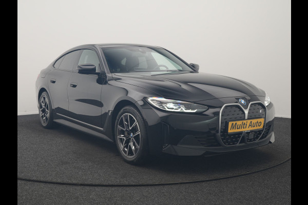 BMW i4 eDrive 35 70 kWh 286pk Dealer O.H | SOH 96,3% | Adaptive Cruise | Camera | Lederen Sportstoelen Verwarmd | Apple Carplay | Keyless | Navigatie | Virtual | DAB | 18"L.M |
