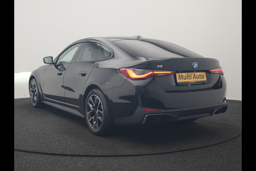 BMW i4 eDrive 35 70 kWh 286pk Dealer O.H | SOH 96,3% | Adaptive Cruise | Camera | Lederen Sportstoelen Verwarmd | Apple Carplay | Keyless | Navigatie | Virtual | DAB | 18"L.M |