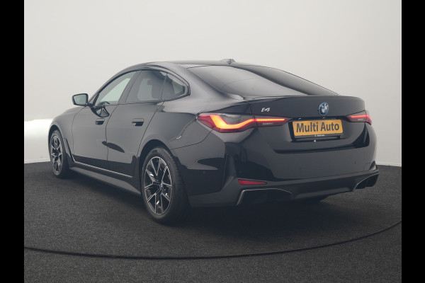 BMW i4 eDrive 35 70 kWh 286pk Dealer O.H | SOH 96,3% | Adaptive Cruise | Camera | Lederen Sportstoelen Verwarmd | Apple Carplay | Keyless | Navigatie | Virtual | DAB | 18"L.M |
