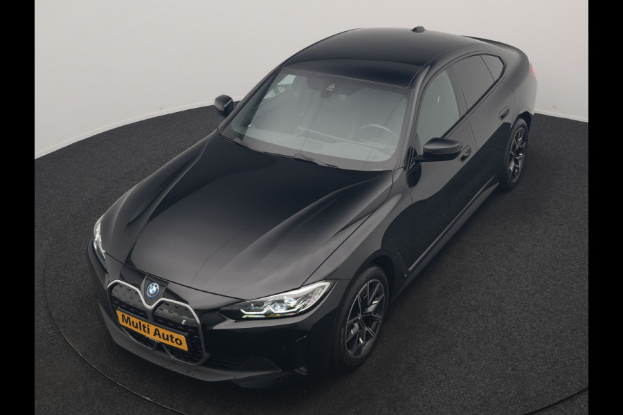 BMW i4 eDrive 35 70 kWh 286pk Dealer O.H | SOH 96,3% | Adaptive Cruise | Camera | Lederen Sportstoelen Verwarmd | Apple Carplay | Keyless | Navigatie | Virtual | DAB | 18"L.M |