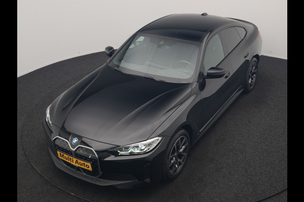 BMW i4 eDrive 35 70 kWh 286pk Dealer O.H | SOH 96,3% | Adaptive Cruise | Camera | Lederen Sportstoelen Verwarmd | Apple Carplay | Keyless | Navigatie | Virtual | DAB | 18"L.M |