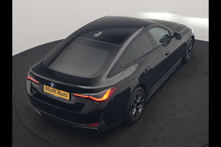 BMW i4 eDrive 35 70 kWh 286pk Dealer O.H | SOH 96,3% | Adaptive Cruise | Camera | Lederen Sportstoelen Verwarmd | Apple Carplay | Keyless | Navigatie | Virtual | DAB | 18"L.M |