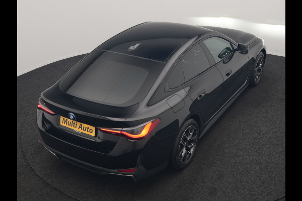 BMW i4 eDrive 35 70 kWh 286pk Dealer O.H | SOH 96,3% | Adaptive Cruise | Camera | Lederen Sportstoelen Verwarmd | Apple Carplay | Keyless | Navigatie | Virtual | DAB | 18"L.M |