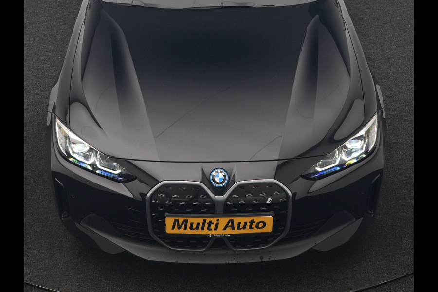 BMW i4 eDrive 35 70 kWh 286pk Dealer O.H | SOH 96,3% | Adaptive Cruise | Camera | Lederen Sportstoelen Verwarmd | Apple Carplay | Keyless | Navigatie | Virtual | DAB | 18"L.M |