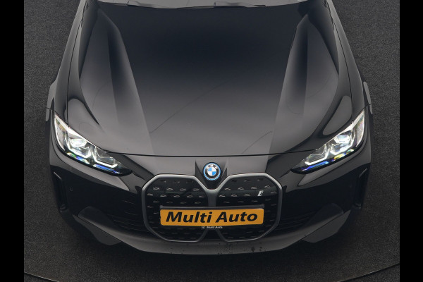 BMW i4 eDrive 35 70 kWh 286pk Dealer O.H | SOH 96,3% | Adaptive Cruise | Camera | Lederen Sportstoelen Verwarmd | Apple Carplay | Keyless | Navigatie | Virtual | DAB | 18"L.M |