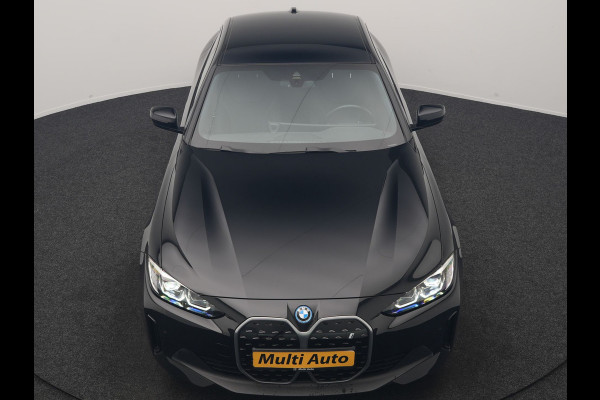 BMW i4 eDrive 35 70 kWh 286pk Dealer O.H | SOH 96,3% | Adaptive Cruise | Camera | Lederen Sportstoelen Verwarmd | Apple Carplay | Keyless | Navigatie | Virtual | DAB | 18"L.M |