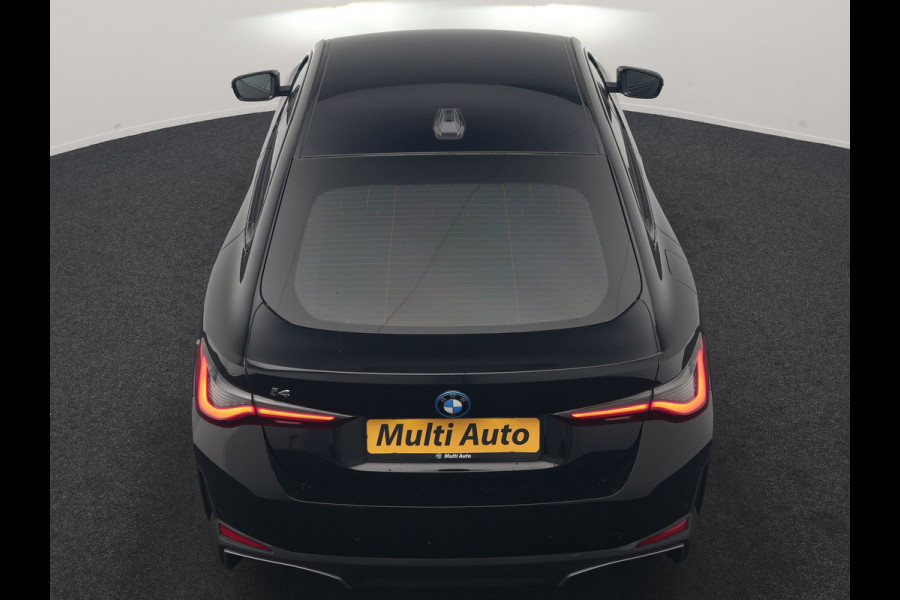BMW i4 eDrive 35 70 kWh 286pk Dealer O.H | SOH 96,3% | Adaptive Cruise | Camera | Lederen Sportstoelen Verwarmd | Apple Carplay | Keyless | Navigatie | Virtual | DAB | 18"L.M |