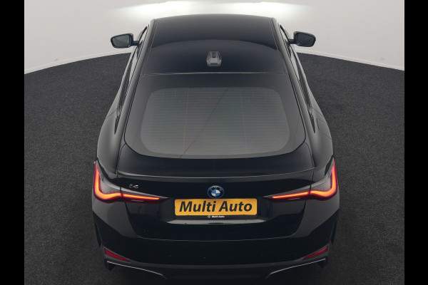 BMW i4 eDrive 35 70 kWh 286pk Dealer O.H | SOH 96,3% | Adaptive Cruise | Camera | Lederen Sportstoelen Verwarmd | Apple Carplay | Keyless | Navigatie | Virtual | DAB | 18"L.M |