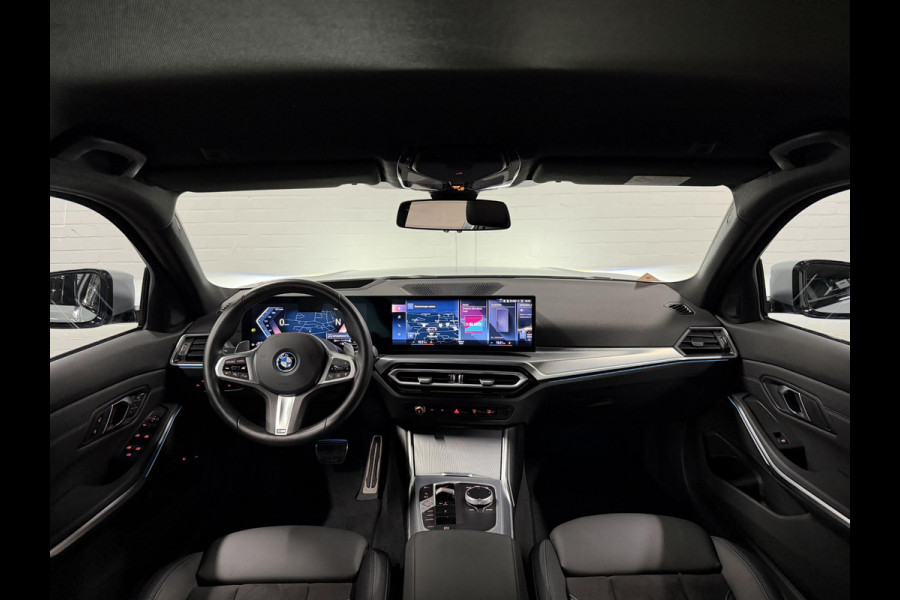 BMW 3 Serie Touring 330e M-Sportpakket | Adapt. Cruise | Stoelverwarming | Sfeerverlichting | Dodehoek | Memory | Head up | Matrix led |