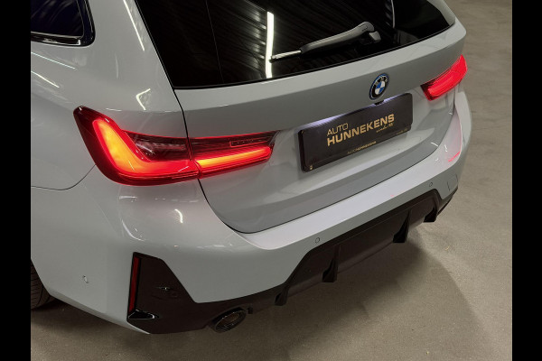 BMW 3 Serie Touring 330e M-Sportpakket | Adapt. Cruise | Stoelverwarming | Sfeerverlichting | Dodehoek | Memory | Head up | Matrix led |