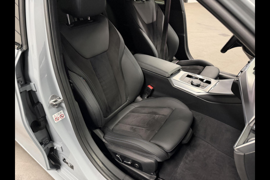 BMW 3 Serie Touring 330e M-Sportpakket | Adapt. Cruise | Stoelverwarming | Sfeerverlichting | Dodehoek | Memory | Head up | Matrix led |