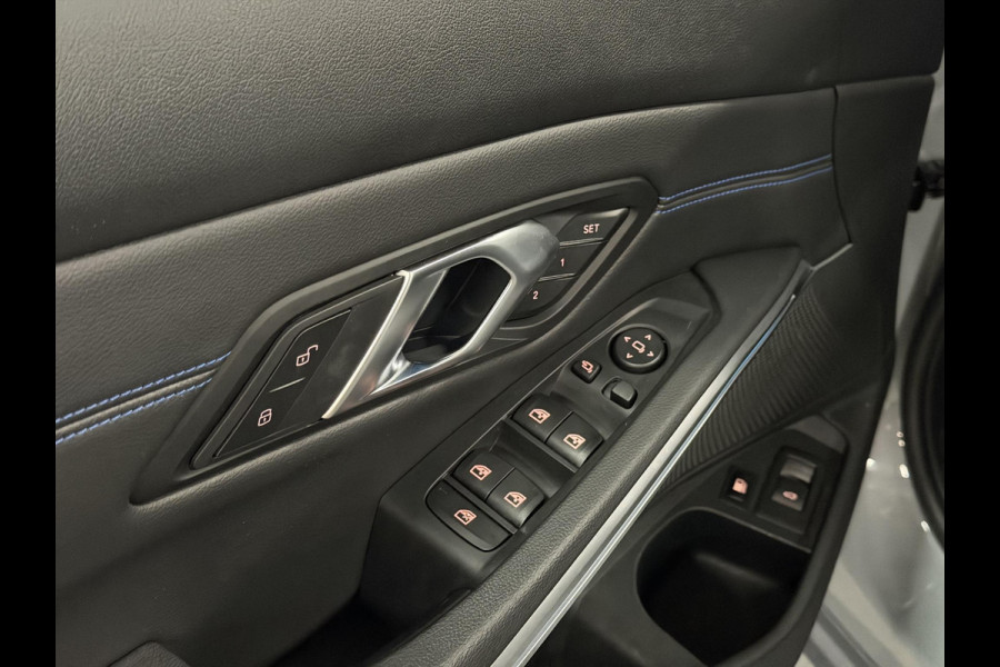 BMW 3 Serie Touring 330e M-Sportpakket | Adapt. Cruise | Stoelverwarming | Sfeerverlichting | Dodehoek | Memory | Head up | Matrix led |