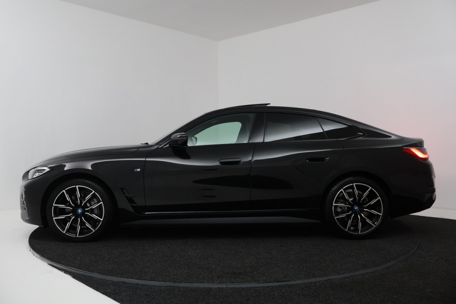 BMW i4 eDrive40 High Executive 84 kWh (PANORAMADAK, STOELVERWARMING, CARPLAY, LED)