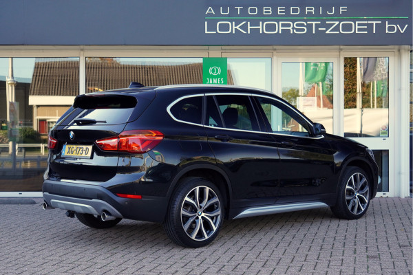 BMW X1 sDrive20i Orange Edition II | Panorama | Trekhaak | ACC | Leer | H/K