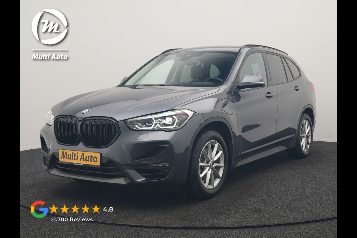 BMW X1 xDrive25e Advantage PHEV 221pk Dealer O.H | SOH 87,9% | Trekhaak Afn. | Adaptive Cruise | Head Up | Camera | Sportstoelen Memory & Verwarmd | Stuur Verwarmd | Sfeerverlichting | Navigatie | DAB | 17"L.M | Plug In Hybrid |