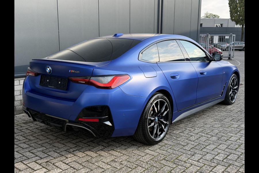 BMW i4 M50 High Executive 84 kWh 19"/SOH 99%/Lederen M-stoelen + memory/Harman Kardon/Keyless/Camera/Adaptief M onderstel/Stoelverwarming