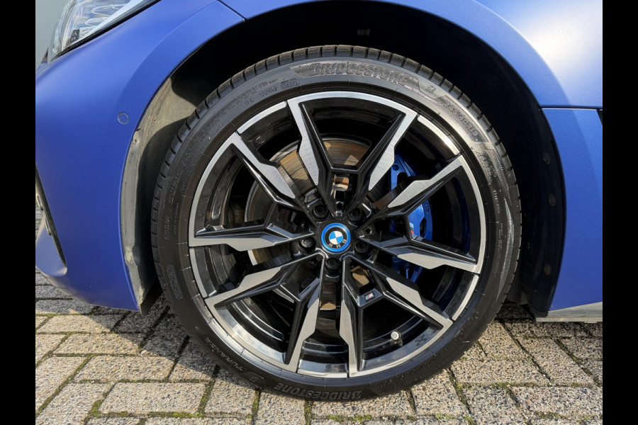 BMW i4 M50 High Executive 84 kWh 19"/SOH 99%/Lederen M-stoelen + memory/Harman Kardon/Keyless/Camera/Adaptief M onderstel/Stoelverwarming