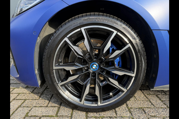 BMW i4 M50 High Executive 84 kWh 19"/SOH 99%/Lederen M-stoelen + memory/Harman Kardon/Keyless/Camera/Adaptief M onderstel/Stoelverwarming