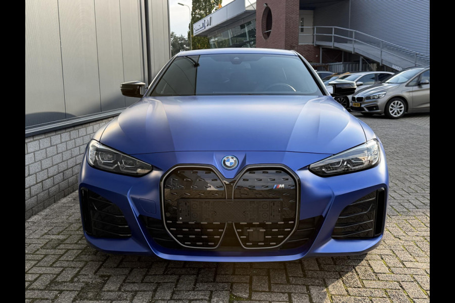 BMW i4 M50 High Executive 84 kWh 19"/SOH 99%/Lederen M-stoelen + memory/Harman Kardon/Keyless/Camera/Adaptief M onderstel/Stoelverwarming