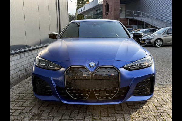 BMW i4 M50 High Executive 84 kWh 19"/SOH 99%/Lederen M-stoelen + memory/Harman Kardon/Keyless/Camera/Adaptief M onderstel/Stoelverwarming