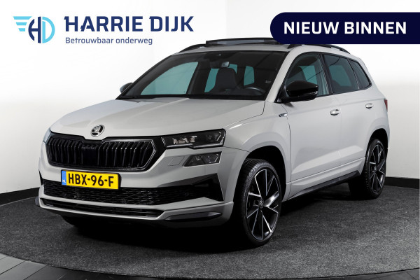 Škoda Karoq 1.5 TSI ACT Sportline Business 150 PK | S/K-Panodak | Dig. Cockpit | Adapt. Cruise | Stoel-+Stuurverw. | PDC | Camera | NAV + App. Connect | ECC | Afn. Trekhaak | LM 19" |