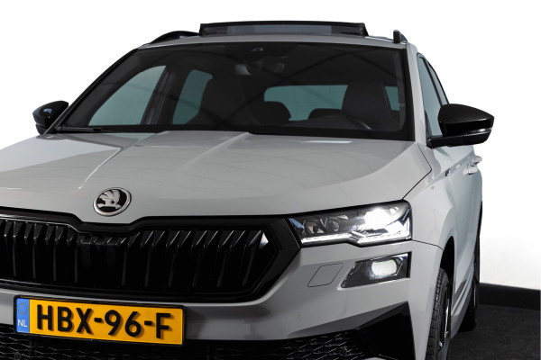 Škoda Karoq 1.5 TSI ACT Sportline Business 150 PK | S/K-Panodak | Dig. Cockpit | Adapt. Cruise | Stoel-+Stuurverw. | PDC | Camera | NAV + App. Connect | ECC | Afn. Trekhaak | LM 19" |