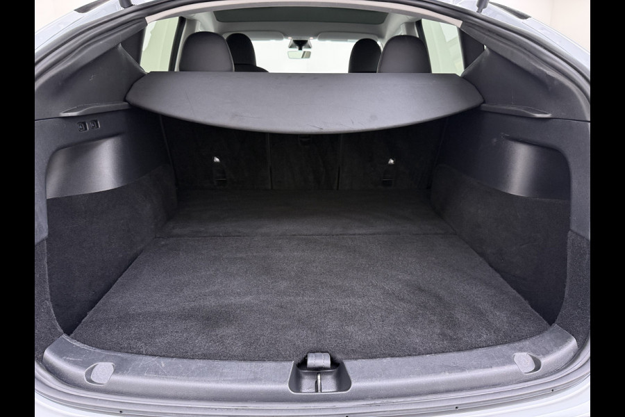 Tesla Model Y RWD 300PK LFP SOH 90% Trekhaak Warmtepomp Leder Camera's Elek.Stoelen+Memory Google®-Navi Panoramadak Stoel+Stuurverwarming Privacy Glas Lmv 19" Led Draadloos Tel. Laden Isofix AMD Ryzen™ Premium Audio 1.600KG Trekgewicht 1e Eigenaar Origineel Nederlandse Auto