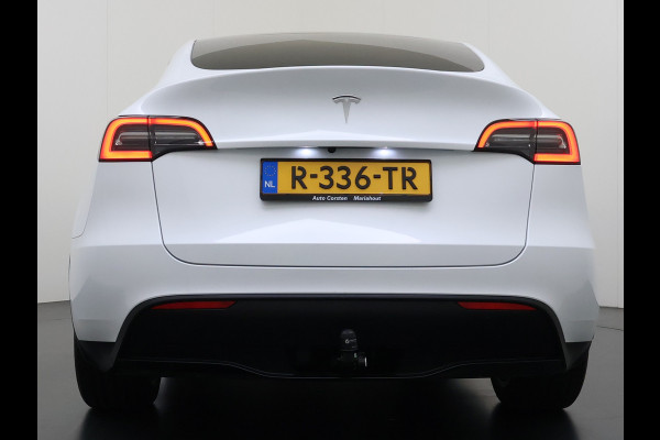 Tesla Model Y RWD 300PK LFP SOH 90% Trekhaak Warmtepomp Leder Camera's Elek.Stoelen+Memory Google®-Navi Panoramadak Stoel+Stuurverwarming Privacy Glas Lmv 19" Led Draadloos Tel. Laden Isofix AMD Ryzen™ Premium Audio 1.600KG Trekgewicht 1e Eigenaar Origineel Nederlandse Auto