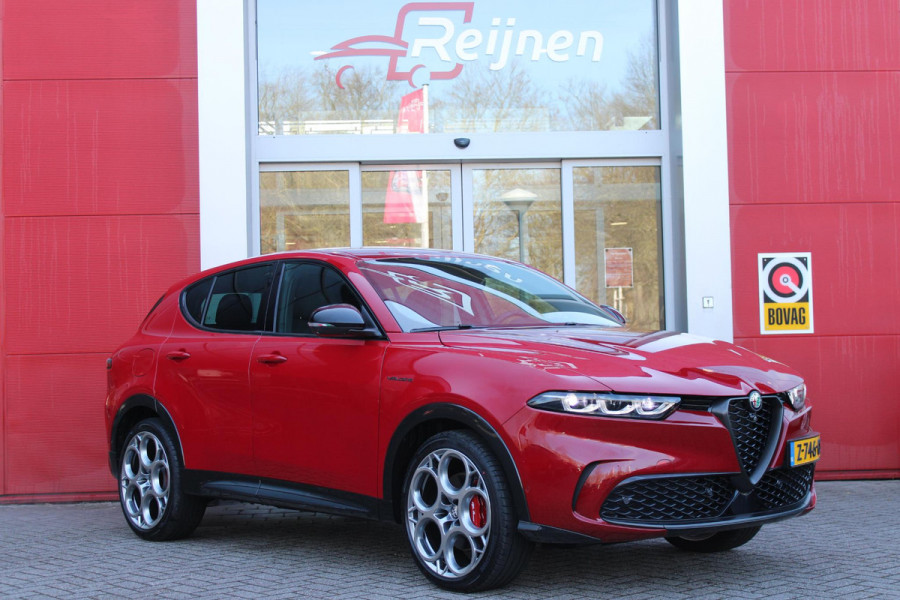 Alfa Romeo Tonale 1.5T 160PK HYbrid VELOCE | LEDEREN BEKLEDING | VOORSTOELEN / STUUR VERWARMD | VOORSTOELEN GEVENTILEERD | VOORSTOELEN ELEKTRISCH VERSTELBAAR MET GEHEUGEN FUNCTIE |  HARMAN CARDON PREMIUM AUDIO | DRAADLOOS APPLE CARPLAY / ANDROID AUTO | 360° CAMERA | AUTOMATISCH DIMMENDE BUITENSPIEGELS | 20"INCH LICHTMETALEN VELGEN | ADAPTIVE CRUISE CONTROL | KEYLESS ENTRY / START | ELEKTRISCH BEDIENBARE ACHTERKLEP | DRAADLOZE TELEFOONLADER | AMBIENT LIGHTING | DONKERE HEMELBEKLEDING | SCHAKELFLIPPERS AAN HET STUUR | VERWARMDE RUITENSPROEIERS |