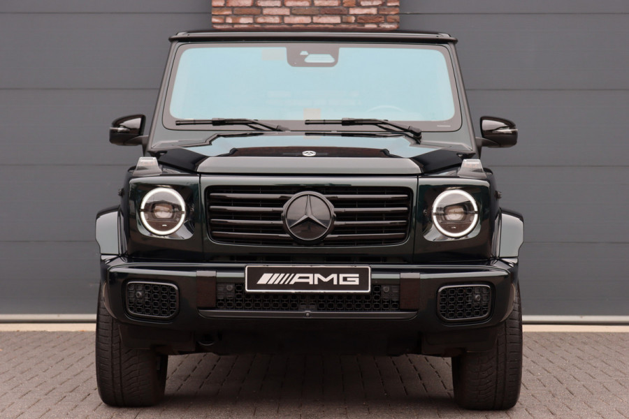 Mercedes-Benz G-Klasse 580 AMG Line 116 kWh | Schuifdak | Techniekpakket | Distronic | Burmester | Nappa Leder | Verwarmd Stuurwiel | Surround Camera | Augmented Reality | Keyless Go |