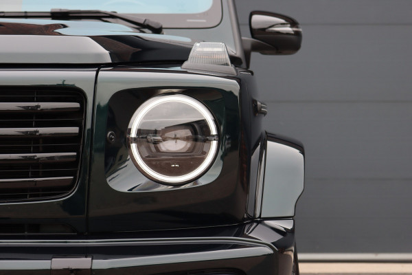 Mercedes-Benz G-Klasse 580 AMG Line 116 kWh | Schuifdak | Techniekpakket | Distronic | Burmester | Nappa Leder | Verwarmd Stuurwiel | Surround Camera | Augmented Reality | Keyless Go |
