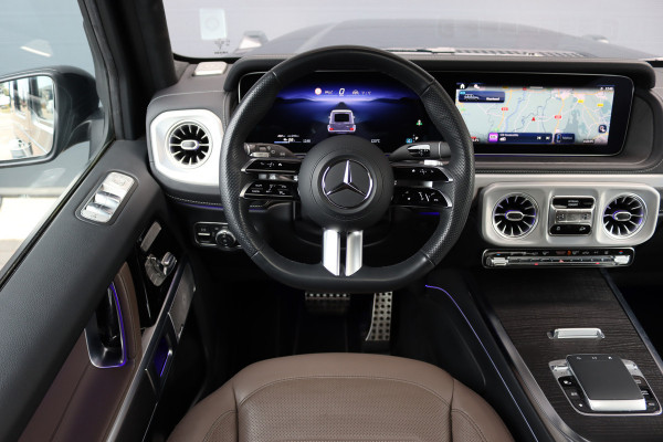 Mercedes-Benz G-Klasse 580 AMG Line 116 kWh | Schuifdak | Techniekpakket | Distronic | Burmester | Nappa Leder | Verwarmd Stuurwiel | Surround Camera | Augmented Reality | Keyless Go |