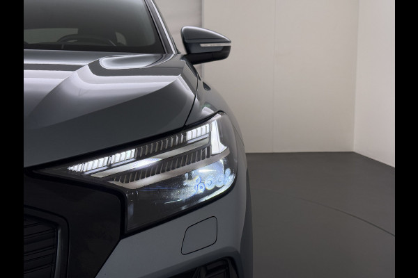 Audi Q4 e-tron SOH 92% 300PK Quattro Launch Edition Advanced Plus 82kWh Warmtepomp Adap.Cruise Trekhaak Head-Up Camera Elek.Stoelen+Memory +Ver Keyless advanced Apple Carplay/Android Auto Bluetooth Privacy Glas Lmv Matrix-Led Isofix 1.200KG Trekgewicht Origineel Nederlandse Auto