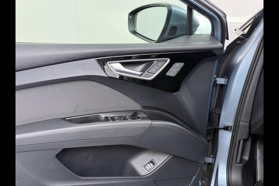 Audi Q4 e-tron SOH 92% 300PK Quattro Launch Edition Advanced Plus 82kWh Warmtepomp Adap.Cruise Trekhaak Head-Up Camera Elek.Stoelen+Memory +Ver Keyless advanced Apple Carplay/Android Auto Bluetooth Privacy Glas Lmv Matrix-Led Isofix 1.200KG Trekgewicht Origineel Nederlandse Auto