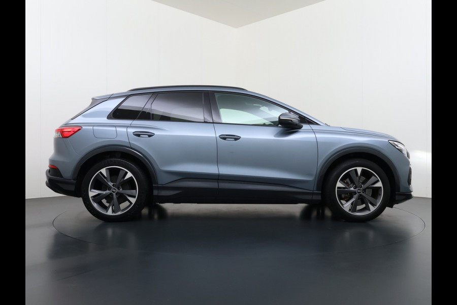 Audi Q4 e-tron SOH 92% 300PK Quattro Launch Edition Advanced Plus 82kWh Warmtepomp Adap.Cruise Trekhaak Head-Up Camera Elek.Stoelen+Memory +Ver Keyless advanced Apple Carplay/Android Auto Bluetooth Privacy Glas Lmv Matrix-Led Isofix 1.200KG Trekgewicht Origineel Nederlandse Auto