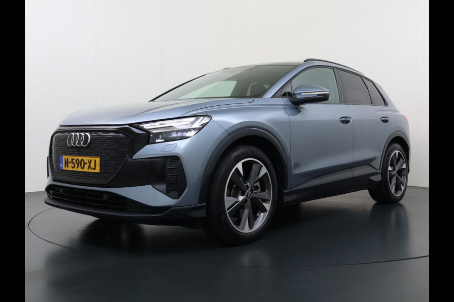 Audi Q4 e-tron SOH 92% 300PK Quattro Launch Edition Advanced Plus 82kWh Warmtepomp Adap.Cruise Trekhaak Head-Up Camera Elek.Stoelen+Memory +Ver Keyless advanced Apple Carplay/Android Auto Bluetooth Privacy Glas Lmv Matrix-Led Isofix 1.200KG Trekgewicht Origineel Nederlandse Auto
