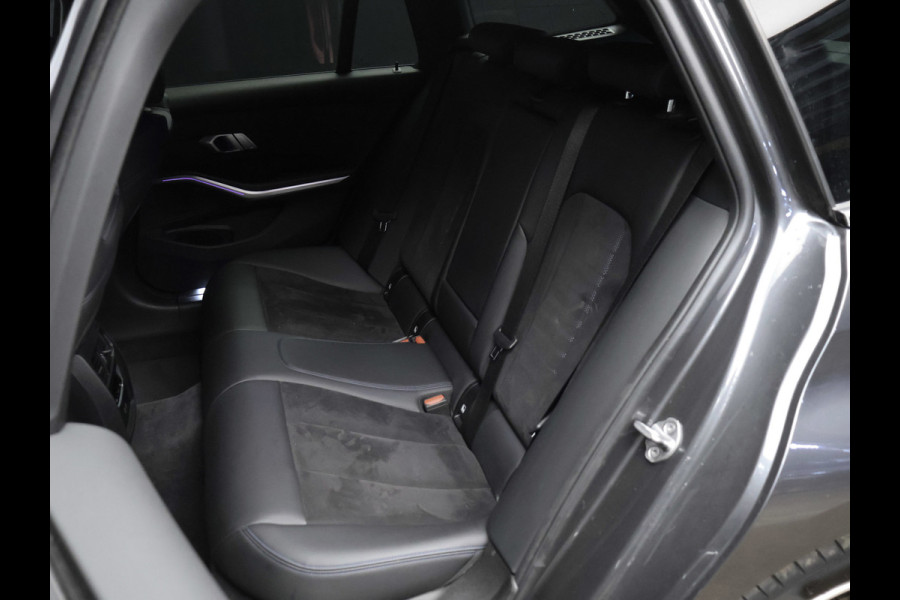 BMW 3 Serie Touring 330e High Executive Sport SOH 90,5% (PANORAMADAK,APPLE CARPLAY,NAVI,CAMERA,SFEERVERLICHTING,LED,SPORTSTOELEN)