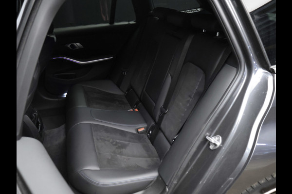 BMW 3 Serie Touring 330e High Executive Sport SOH 90,5% (PANORAMADAK,APPLE CARPLAY,NAVI,CAMERA,SFEERVERLICHTING,LED,SPORTSTOELEN)