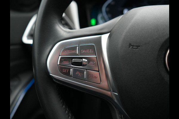 BMW 3-serie 320e Advantage PHEV 204pk Dealer O.H | SOH 87,2% | Head Up | Adaptive Cruise | Camera | Adaptief Onderstel | Laser LED | Lederen Sportstoelen Memory & Verwarmd | Apple Carplay | Blis | Virtual | Navigatie | DAB | 19"L.M |