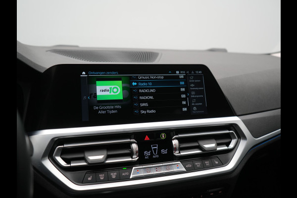 BMW 3-serie 320e Advantage PHEV 204pk Dealer O.H | SOH 87,2% | Head Up | Adaptive Cruise | Camera | Adaptief Onderstel | Laser LED | Lederen Sportstoelen Memory & Verwarmd | Apple Carplay | Blis | Virtual | Navigatie | DAB | 19"L.M |