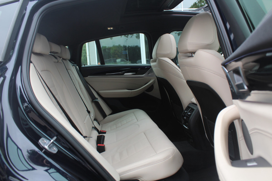 BMW X4 M40i High Exe. M Sport 73.952 km NL Auto. / Trekhaak / Panoramadak / Camera / Head-up / Luxe Leder / 21'' / Harman Kardon / Navigatie / Stuur+Stoelverwarming / DAB / Dodehoek / Cruise Control