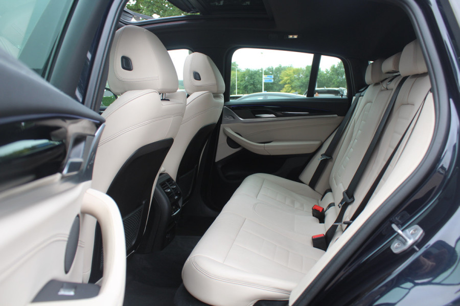 BMW X4 M40i High Exe. M Sport 73.952 km NL Auto. / Trekhaak / Panoramadak / Camera / Head-up / Luxe Leder / 21'' / Harman Kardon / Navigatie / Stuur+Stoelverwarming / DAB / Dodehoek / Cruise Control